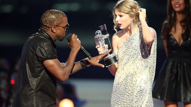 Kanye West and Taylor Swift on stage at MTV VMAs