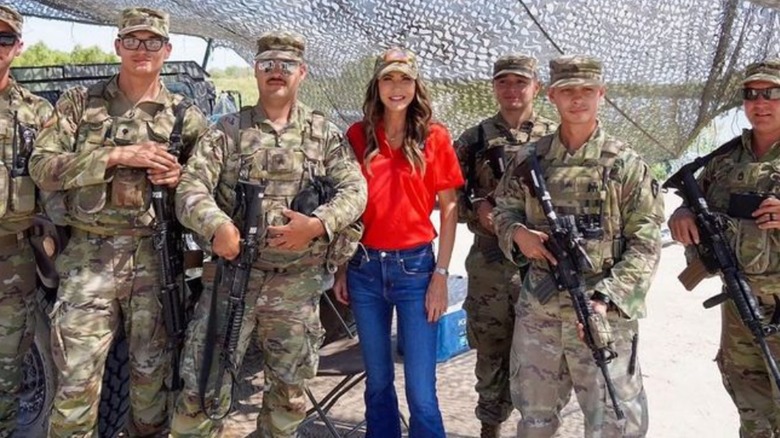 Kristi Noem red shirt jeans