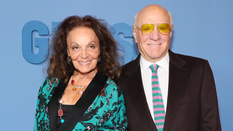 Diane von Furstenberg and Barry Diller smile at an event