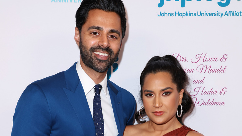 Hasan Minhaj and Beena Patel posing