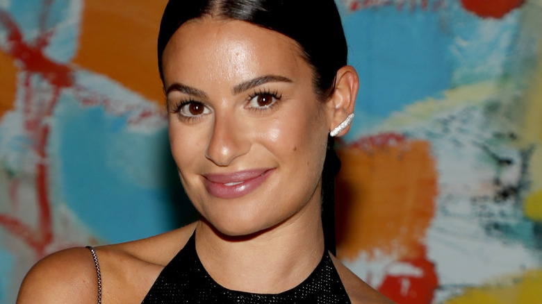 Lea Michele smiling at event