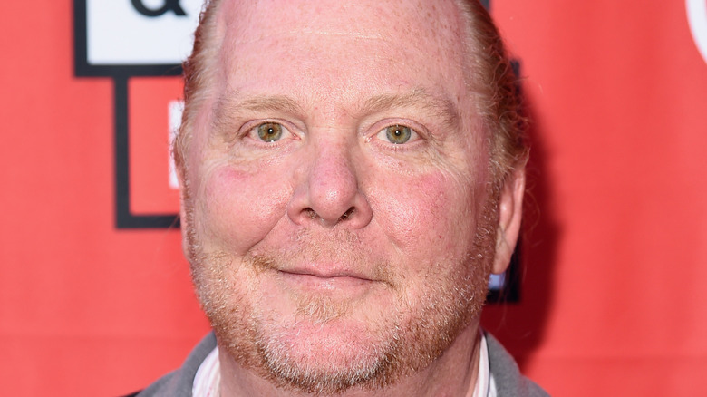 Mario Batali doing side-smile