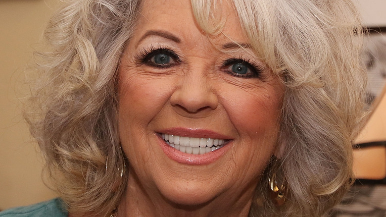 Paula Deen smiling at event