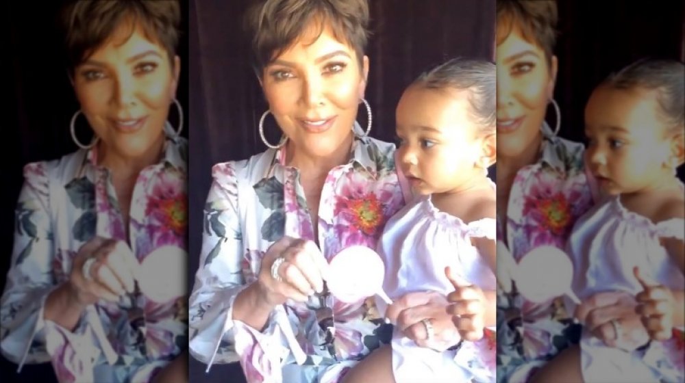 Kris Jenner holding Chicago West