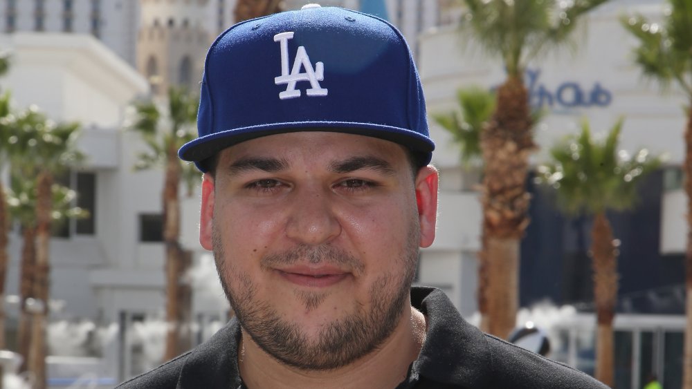 Rob Kardashian smiling outside