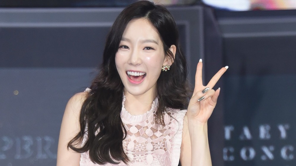 Taeyeon at a press conference in 2017