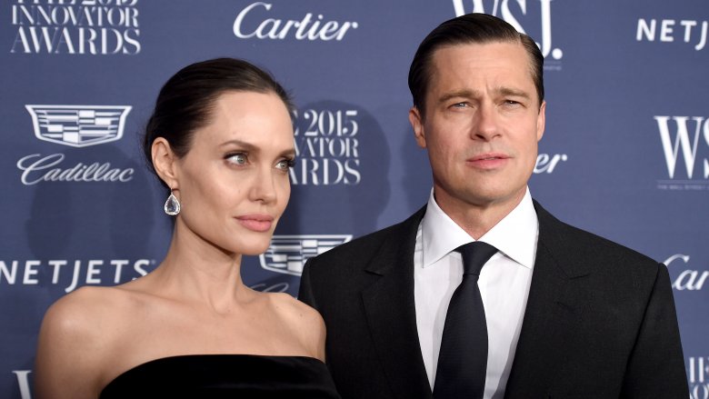 Brad Pitt and Angelina Jolie pose on red carpet