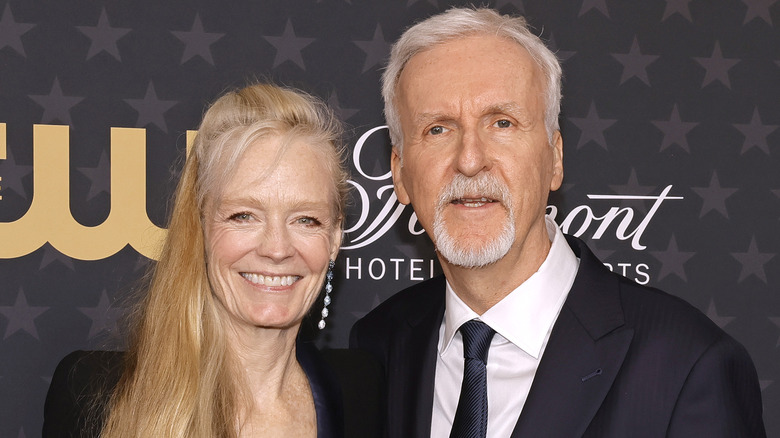 James Cameron with Suzy Amis on red carpet