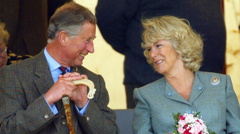 Prince Charles smiling at Camilla Parker Bowles