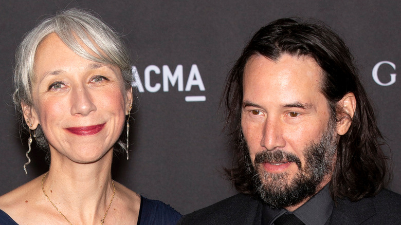 Alexandra Grant and Keanu Reeves at a gala