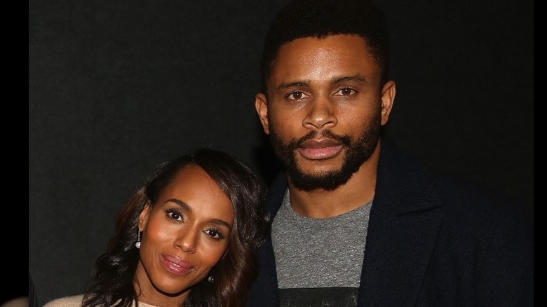 Kerry Washington leaning on Nnamdi Asomugha