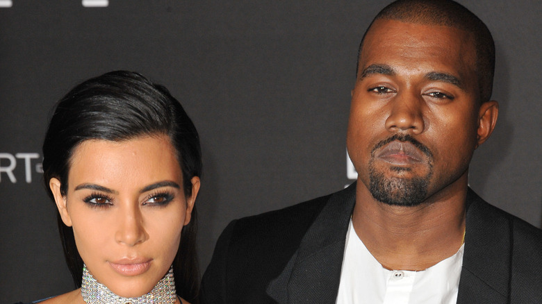 Kim Kardashian and Kanye West posing together
