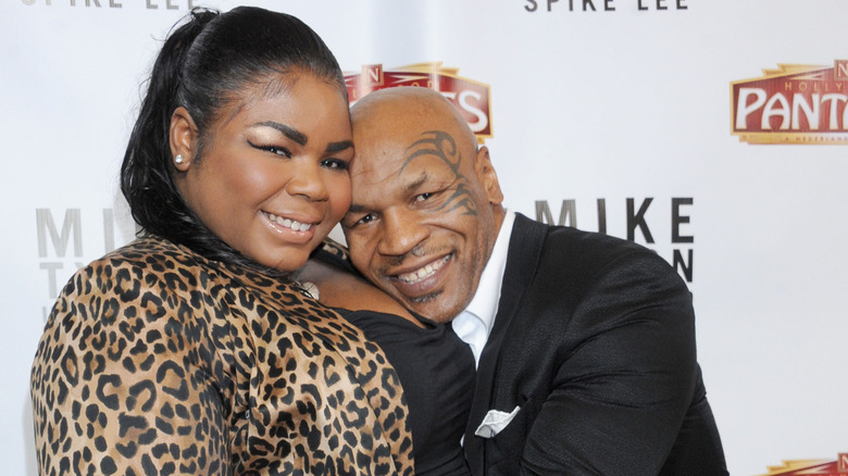 Mike Tyson hugs Mikey Lorna in 2013