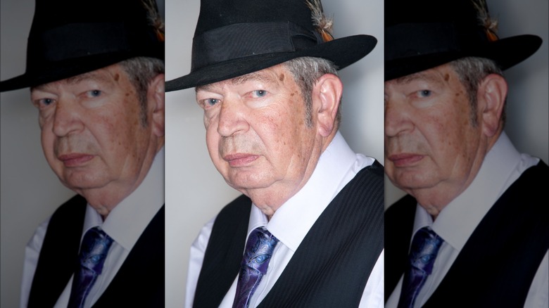 Richard Harrison wearing a hat