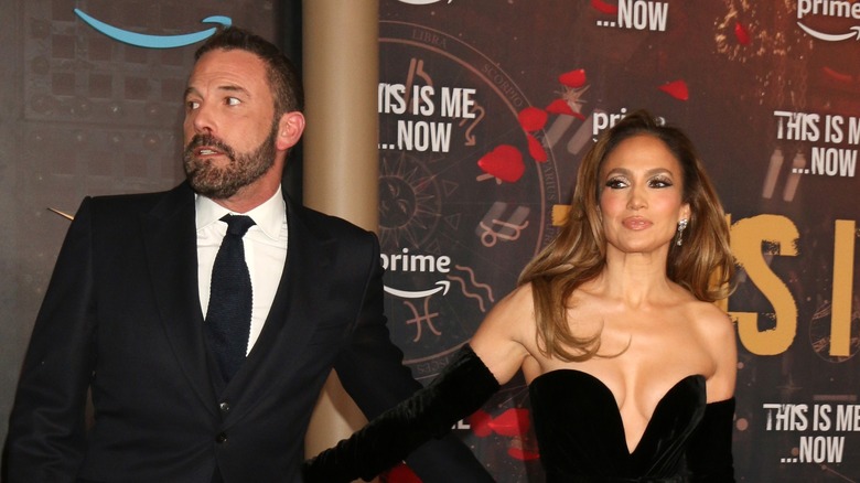 Ben Affleck, Jennifer Lopez reaching toward each other