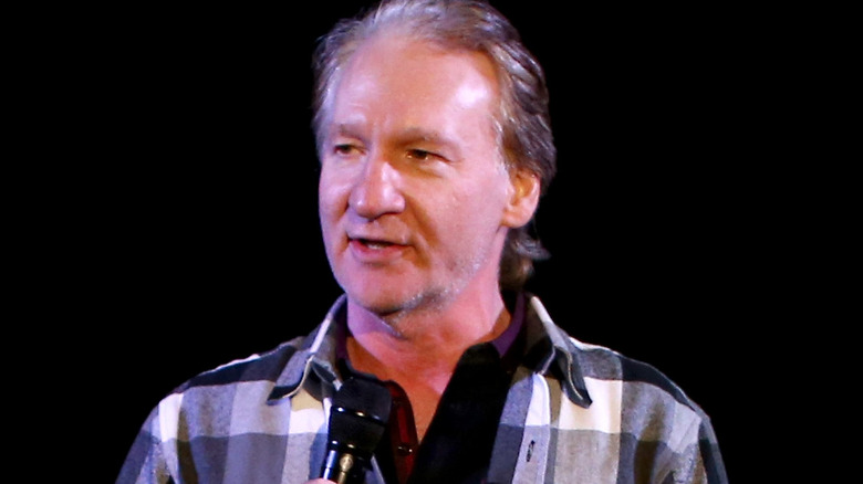 Bill Maher performing onstage 