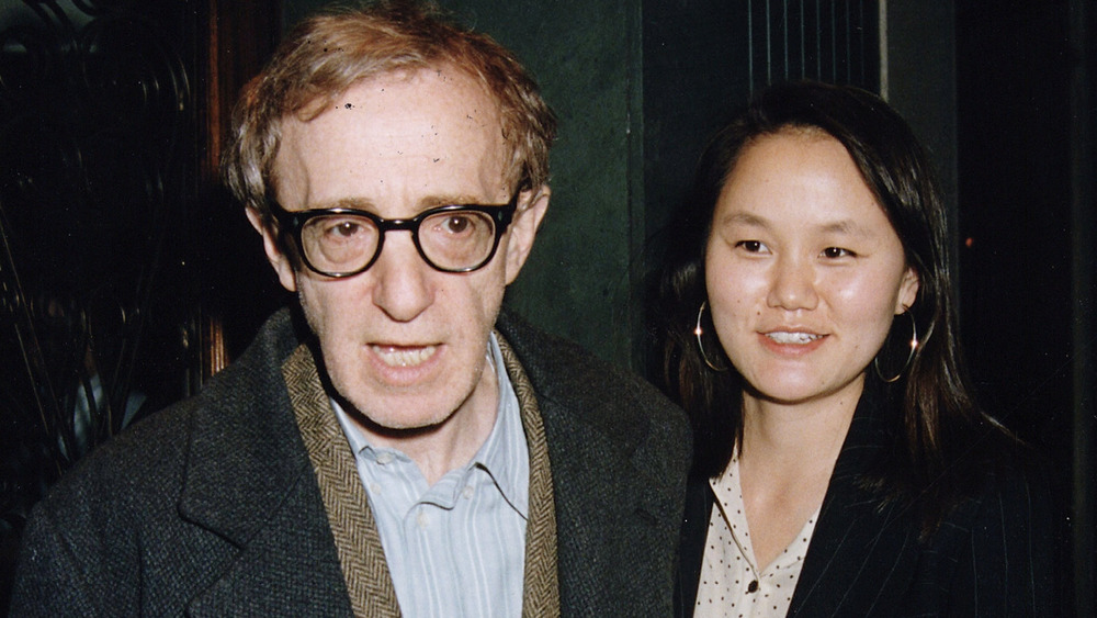 Woody Allen and Soon-Yi Previn walking and talking