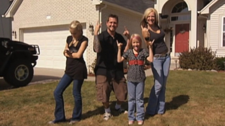 The LaBrie family posing during the opening sequence