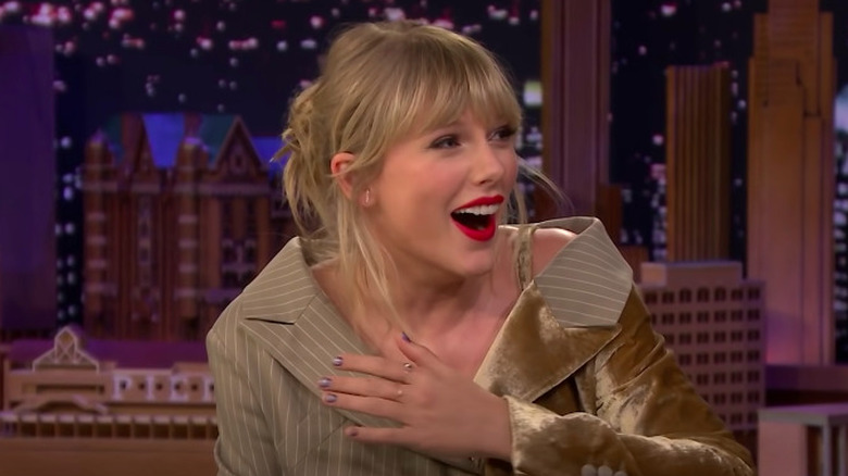 Taylor Swift laughing in shock