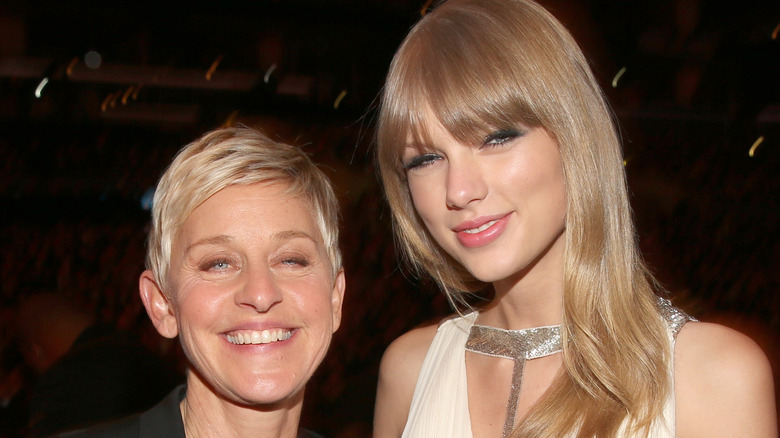 Taylor Swift posing with Ellen DeGeneres