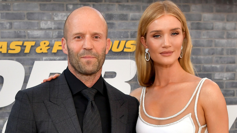 Rosie Huntington-Whiteley smiling with Jason Statham