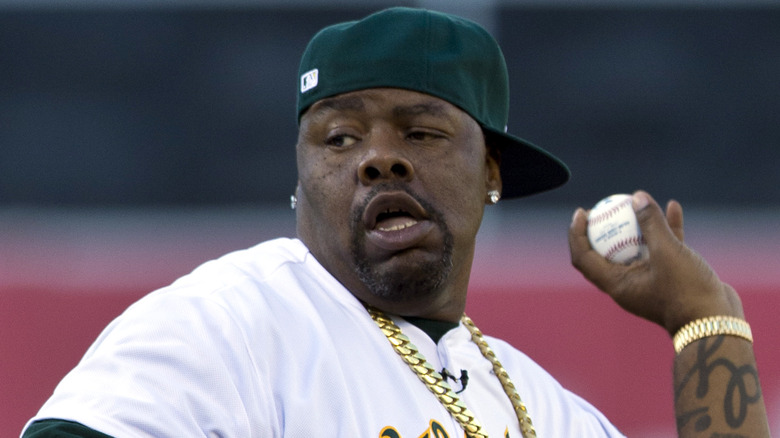 Biz Markie throwing a baseball