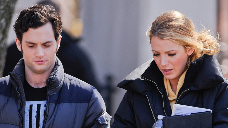 Penn Badgley and Blake Lively walking together