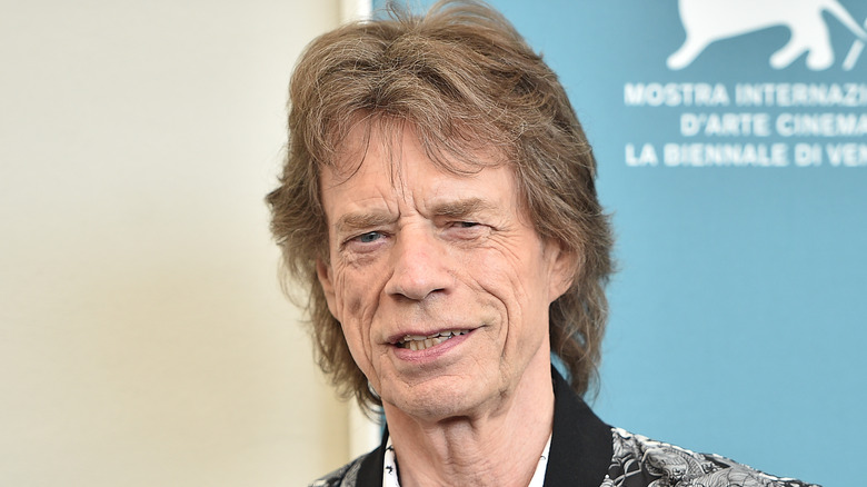 Mick Jagger posing at event