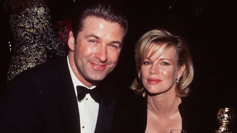 Alec Baldwin and Kim Basinger posing