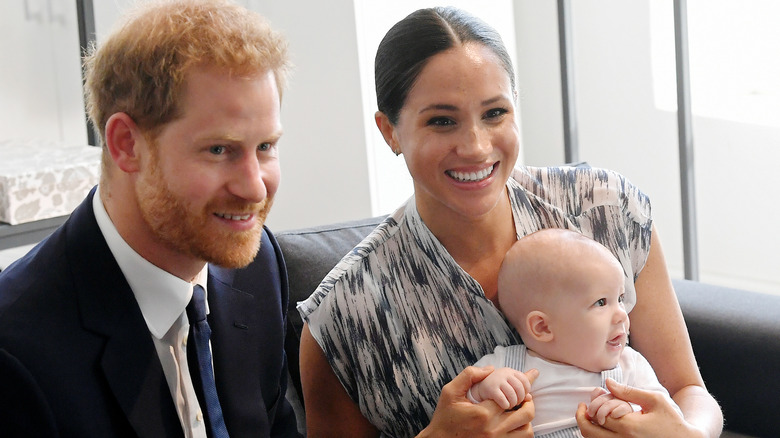 Prince Harry, Meghan Markle, and their son Archie Mountbatten-Windsor in South Africa in 2019