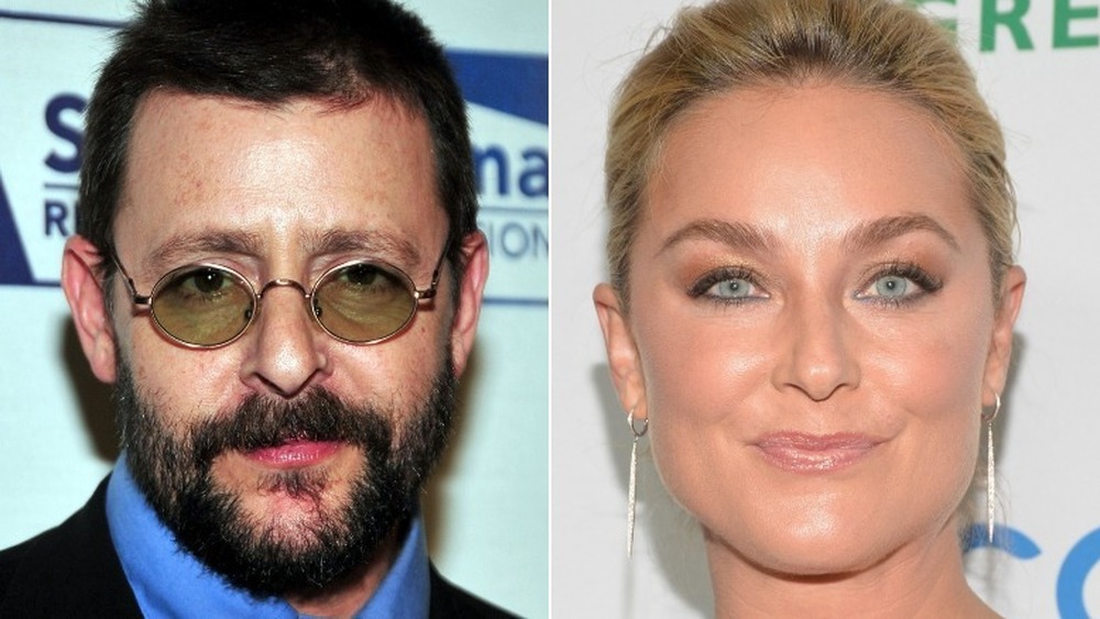 Judd Nelson smirking (left), Elisabeth Rohm smiling (right)