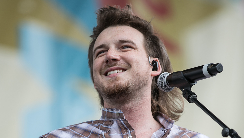 Morgan Wallen performing on stage