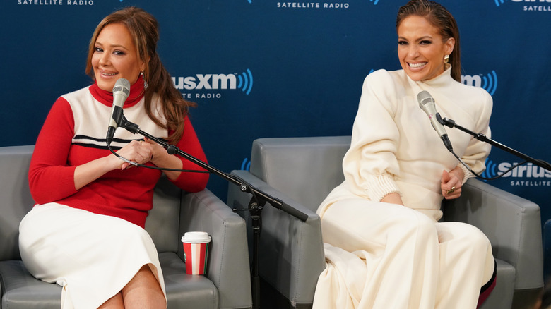 Leah Remini and Jennifer Lopez sitting together