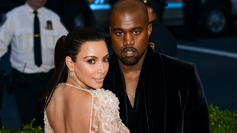 Kim Kardashian and Kanye West posing together