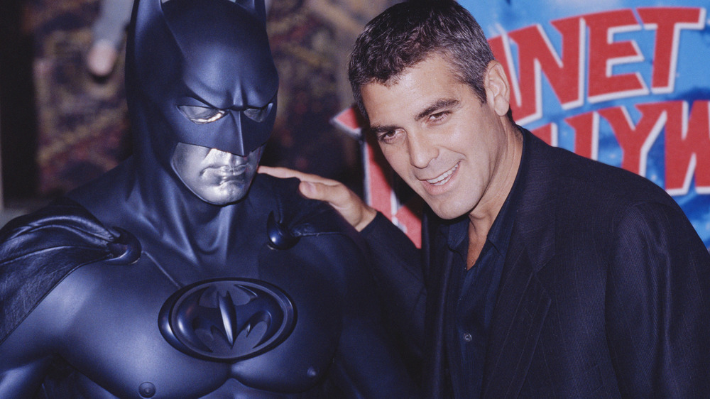 George Clooney posing Batman