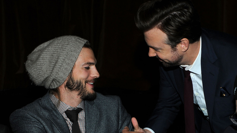 Ashton Kutcher and Jason Sudeikis shaking hands