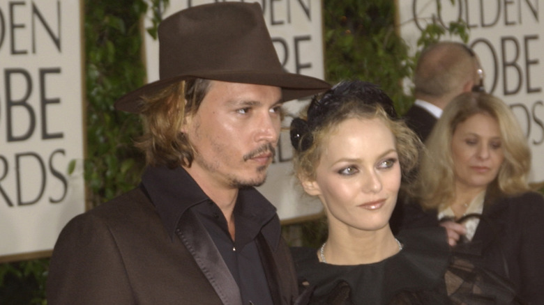 Johnny Depp and Vanessa Paradis posing