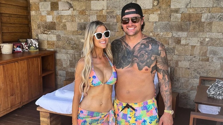 Christina Hall poses in bikini with husband