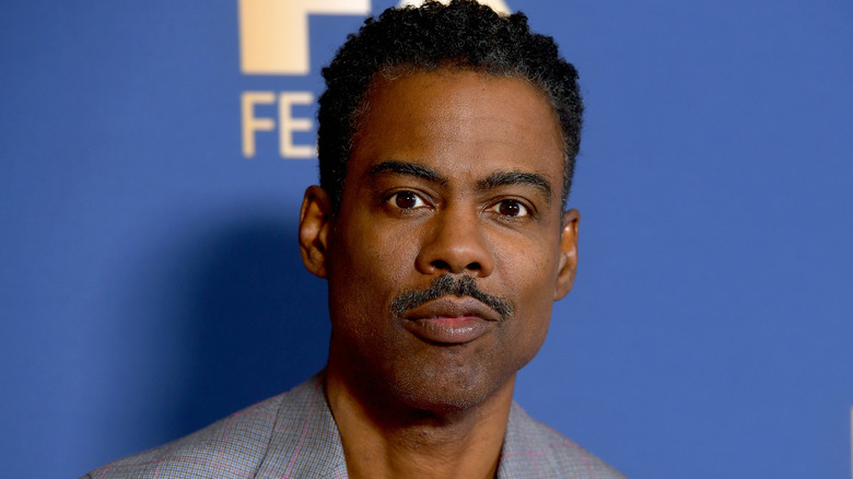 chris rock blue background