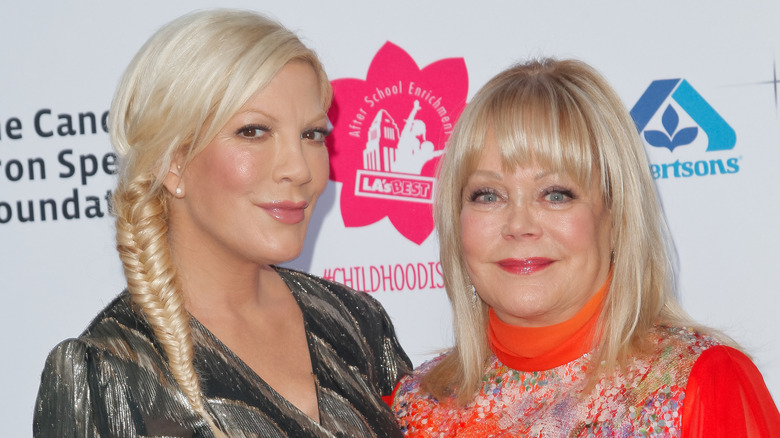 Tori Spelling posing with mom Candy Spelling