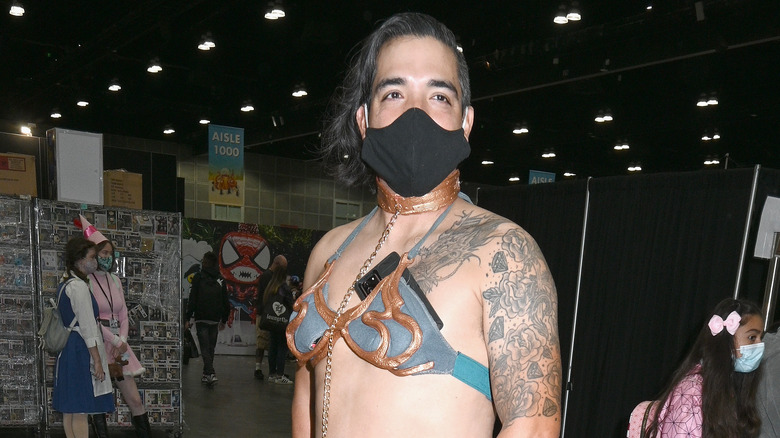 A cosplayer in 2021 dressed as "slave Leia" in the gold bikini