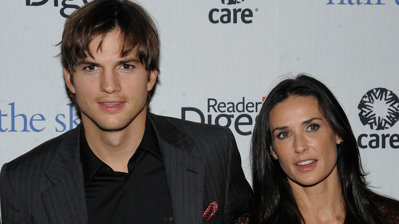 Ashton Kutcher and Demi Moore smiling