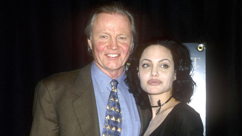 Angelina Jolie posing with her father Jon Voight