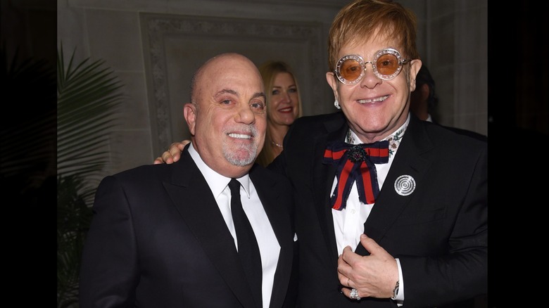 Billy Joel and Elton John smiling