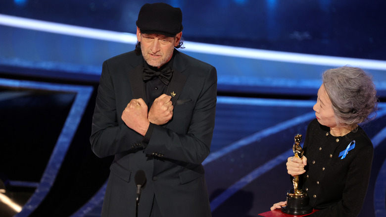 troy kotsur on the oscars stage