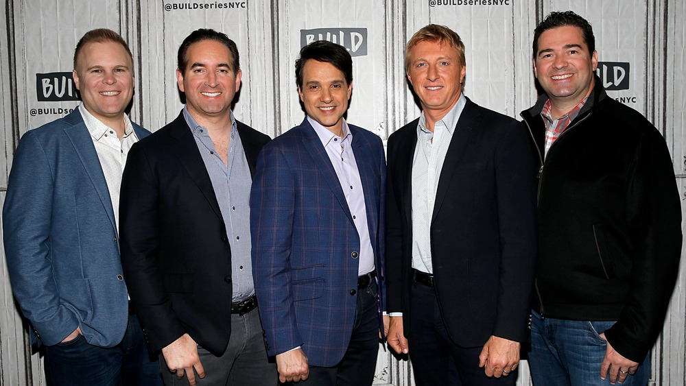 Josh Heald, Hayden Schlossberg, Ralph Macchio, Billy Zabka, and Jon Hurwitz attend an event 