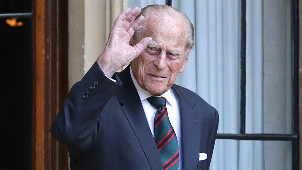 Prince Philip waving to the crowd