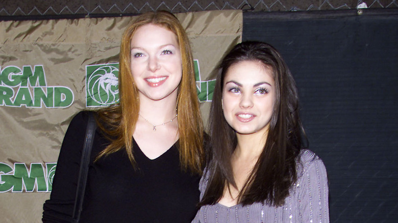 Laura Prepon and Mila Kunis smiling