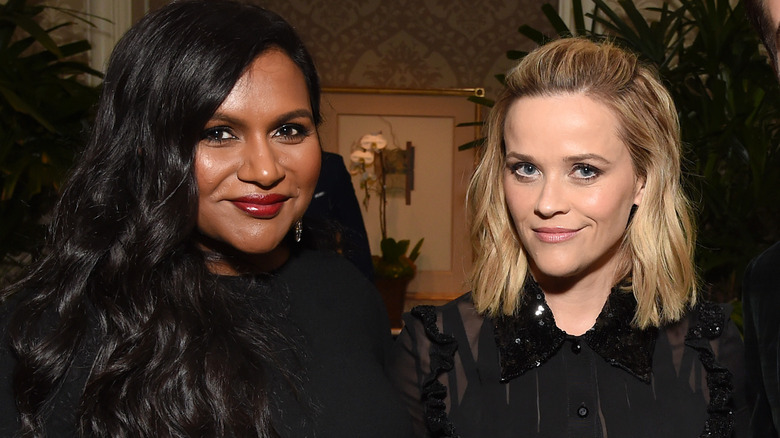 Mindy Kaling and Reese Witherspoon wearing black