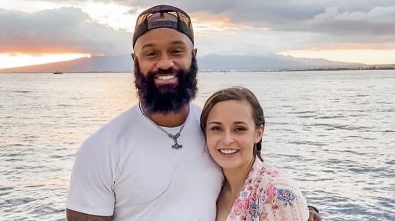 Samaje Perine, Megan Perine, cuddling on a boat, 2021 photo